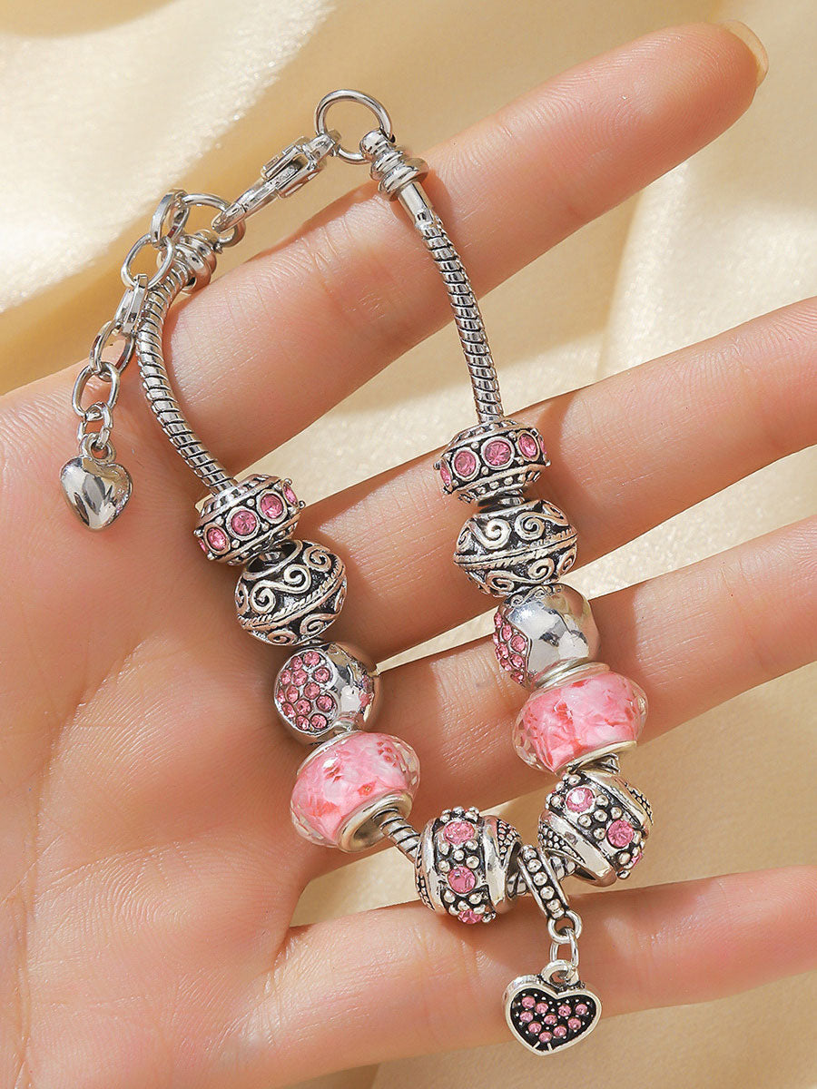 Pulseira rosa câncer de mama feminino