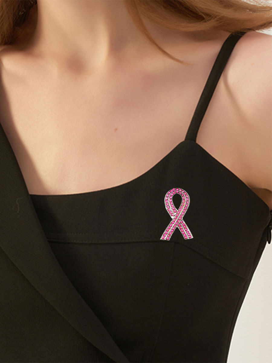 Broche rosa câncer de mama feminino