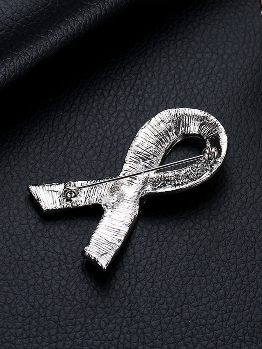 Broche rosa câncer de mama feminino