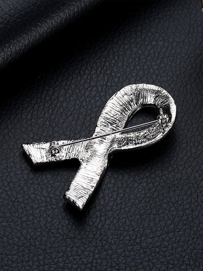 Broche rosa câncer de mama feminino